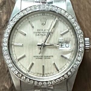 Men’s 36MM stainless Rolex.